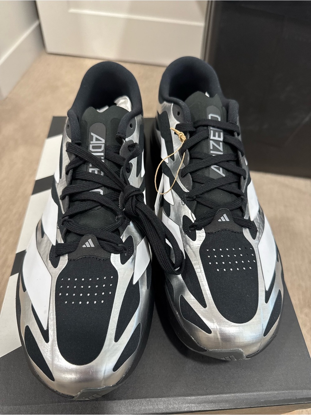 Adidas Men’s Black & Silver ADIZERO EVO SL EXO M Sneakers
